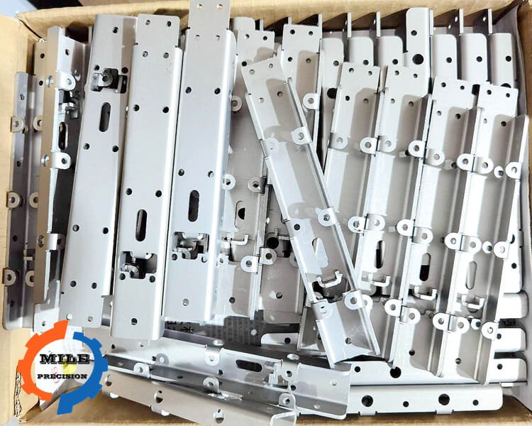 Stamped stainless steel shield and thin metal part