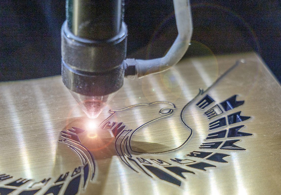 Laser Marking vs Engraving vs Etching: A Practical Guide for CNC Parts 8 Black anodized aluminum CNC part with marking and surface finish considerations